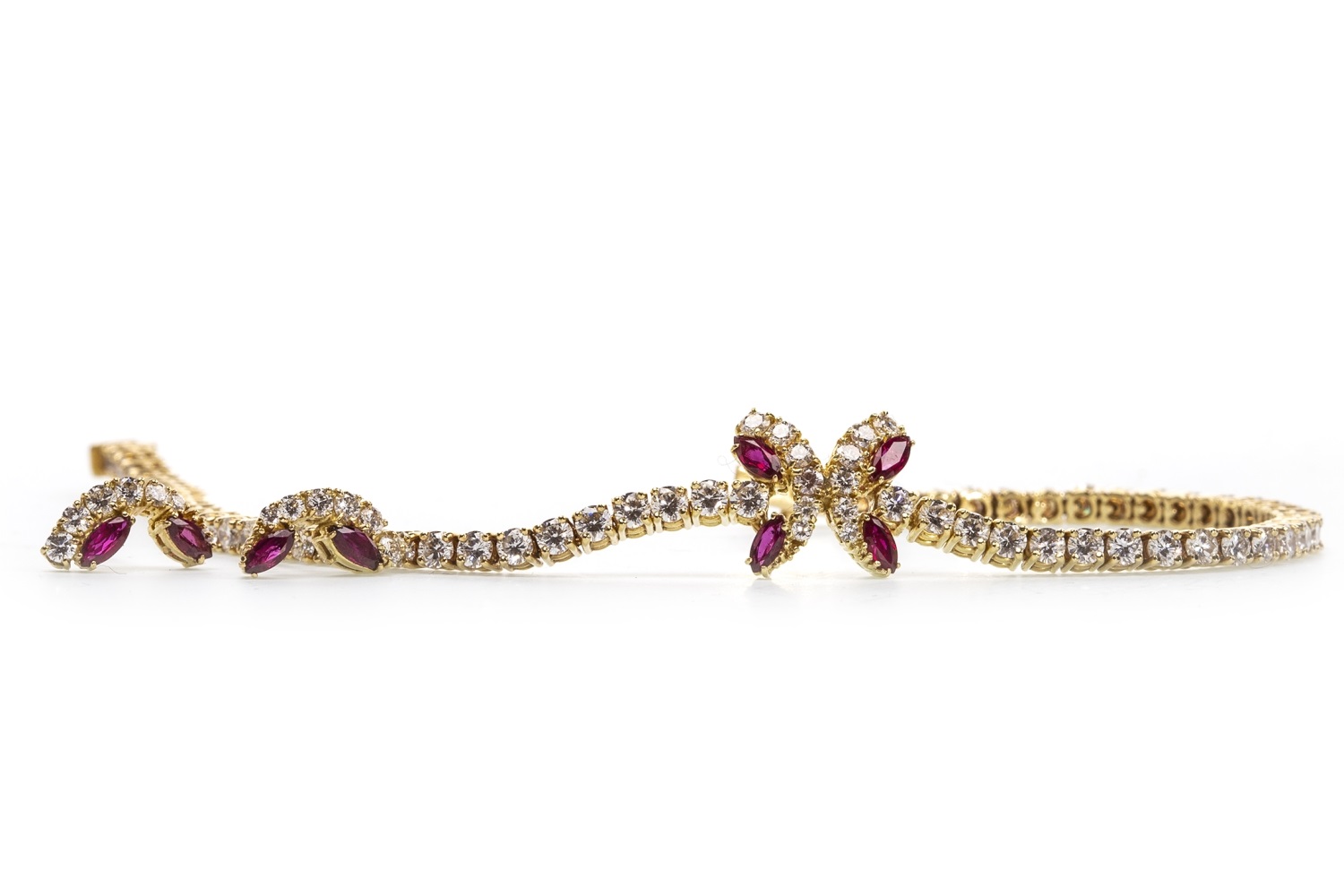 A RUBY AND DIAMOND BRACELET AND MATCHING EARRINGS