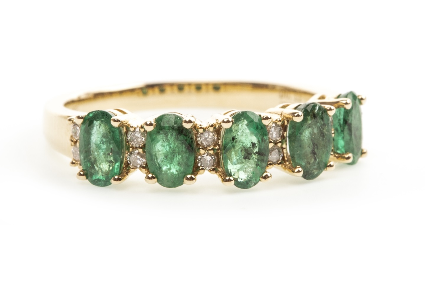 AN EMERALD AND DIAMOND RING