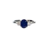 A SAPPHIRE AND DIAMOND RING