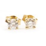 A PAIR OF DIAMOND STUD EARRINGS