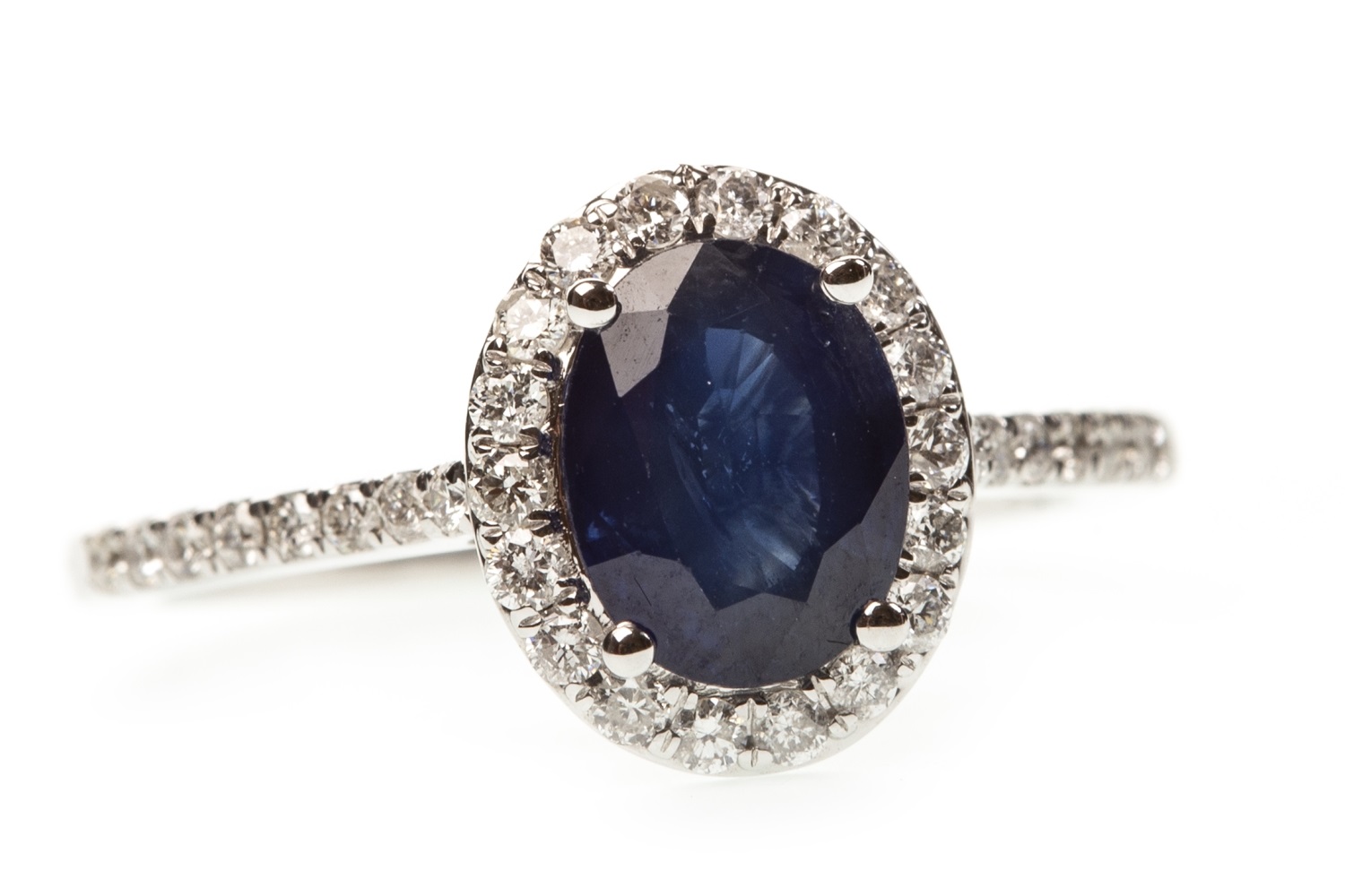 A SAPPHIRE AND DIAMOND RING