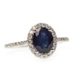 A SAPPHIRE AND DIAMOND RING