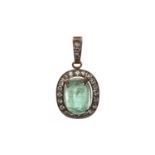 A GREEN GEM SET AND DIAMOND PENDANT