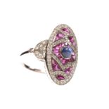 A RUBY, SAPPHIRE AND DIAMOND RING