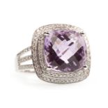 AN AMETHYST AND DIAMOND RING