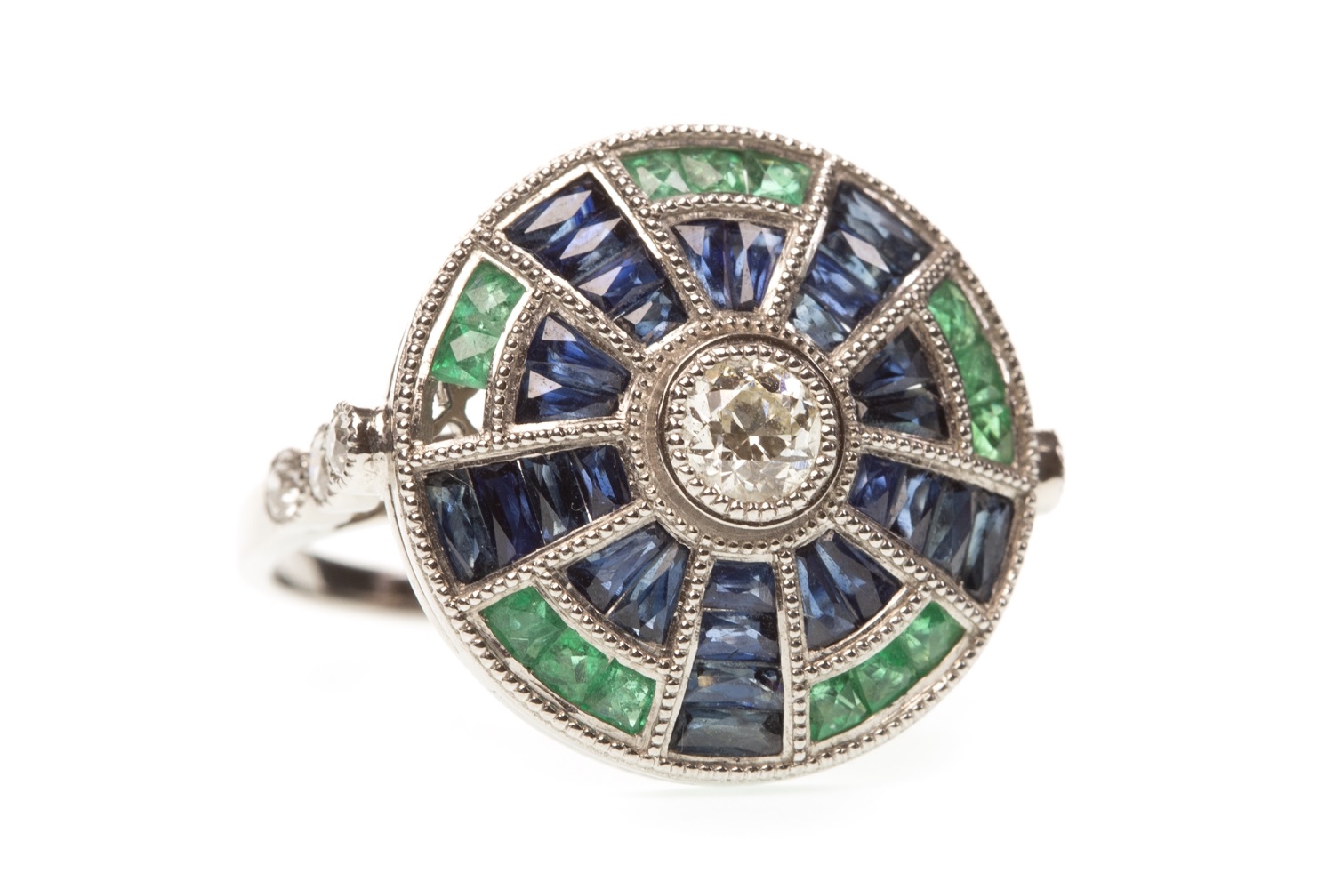 A SAPPHIRE, EMERALD AND DIAMOND RING