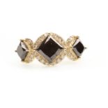 A BLACK AND WHITE DIAMOND RING