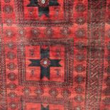 AN AFGHAN BOKHARA RUG