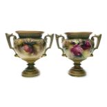 A PAIR OF ROYAL WORCESTER VASES