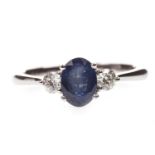 A SAPPHIRE AND DIAMOND RING