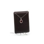 A GARNET AND DIAMOND PENDANT