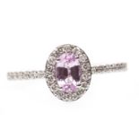 A PINK SAPPHIRE AND DIAMOND RING