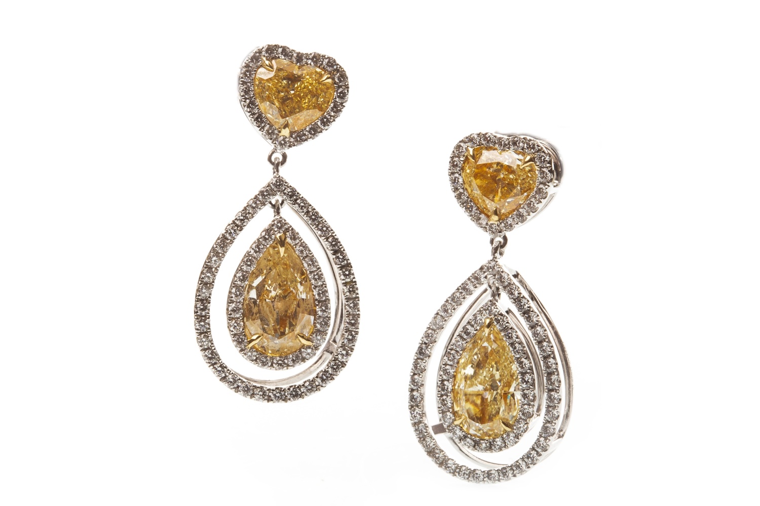 A CERTIFICATED PAIR OF YELLOW AND WHITE DIAMOND EARRINGS