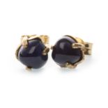 A PAIR OF HEART SHAPED SAPPHIRE EARRINGS