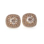 A PAIR OF DIAMOND CLUSTER EARRINGS