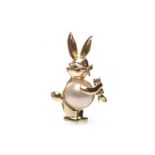 A MABE PEARL AND RUBY BUNNY BROOCH