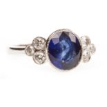 A SAPPHIRE AND DIAMOND RING