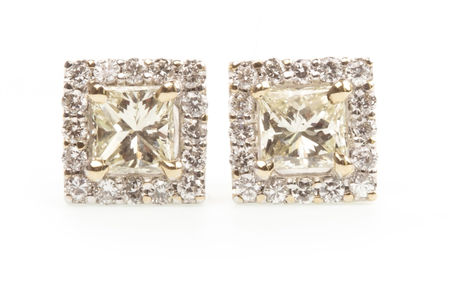 A PAIR OF DIAMOND EARRINGS