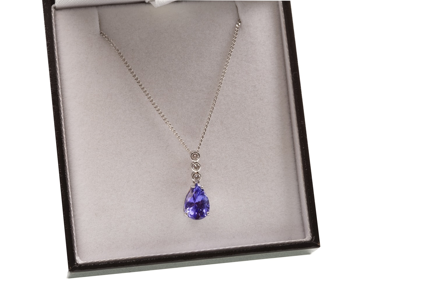 A TANZANITE AND DIAMOND PENDANT