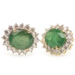 A PAIR OF EMERALD AND DIAMOND CLUSTER EARRINGS