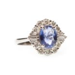 A SAPPHIRE AND DIAMOND CLUSTER RING