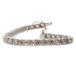 A DIAMOND TENNIS BRACELET