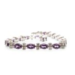 AN AMETHYST AND DIAMOND BRACELET