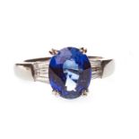 A SAPPHIRE AND DIAMOND RING