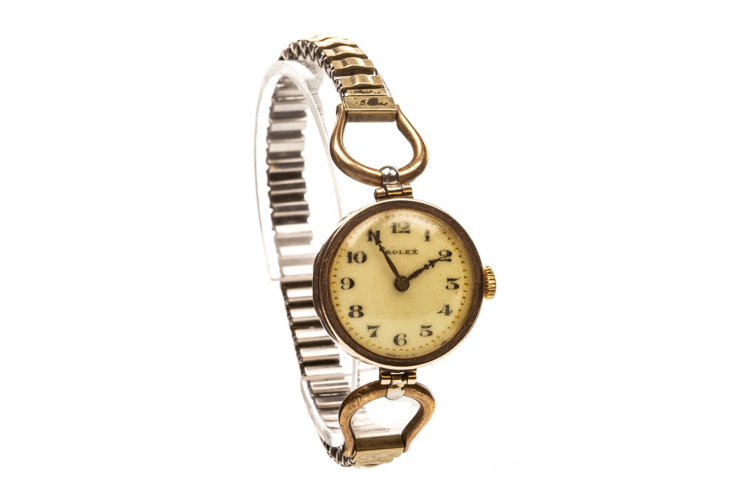 A LADY'S ROLEX GOLD WRIST WATCH