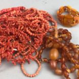 A COLLECTION OF CORAL BEAD NECKLACES AND OTHER BEAD NECKLACES