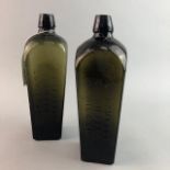 A PAIR OF P. LOOPUYT & CO DISTILLERS GLASS BOTTLES