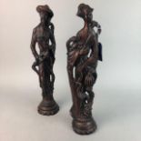 A PAIR OF ASIAN CARVED WOOD FIGURES