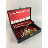 A GROUP OF COSTUME JEWELLERY CONTAINED IN A JEWELLERY BOX