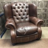 A BROWN LEATHER EASY CHAIR