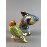 A ROYAL CROWN DERBY PAPERWEIGHT OF 'GUPPY' AND A 'RED FACE LOVE BIRD'