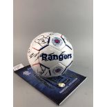 A SIGNED RANGERS FOOTBALL AND A FOOTBALL PROGRAMME