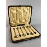 A CASED SET OF SILVER GILT COFFEE SPOONS