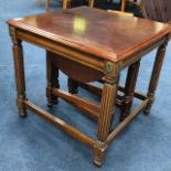 A MAHOGANY NEST OF THREE TABLES