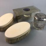 AN ENAMELLED BOX, SILVER LIDDED CRYSTAL BOX AND BRUSHES