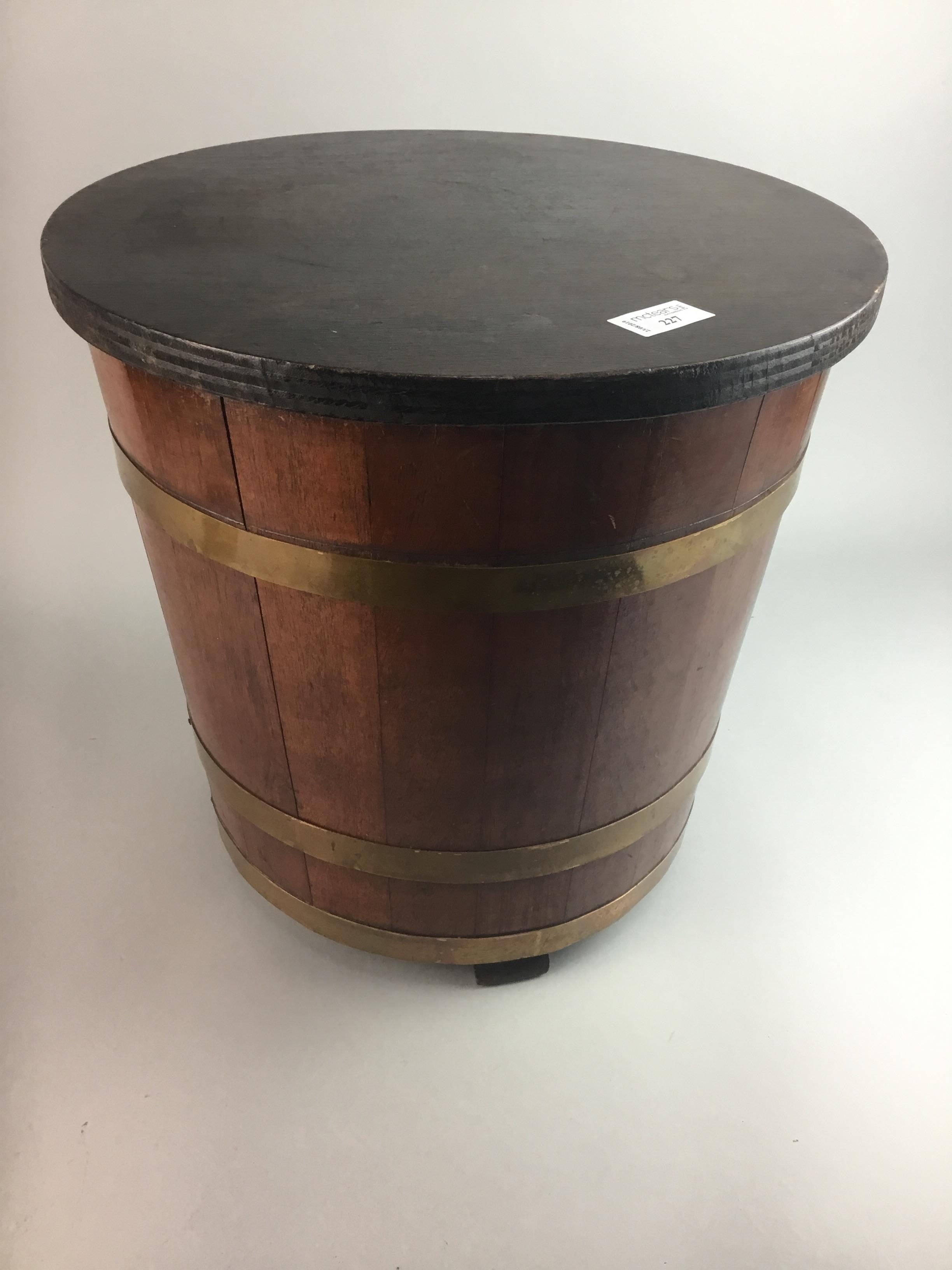 A MAHOGANY AND BRASS BOUND FUEL BUCKET