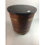 A MAHOGANY AND BRASS BOUND FUEL BUCKET