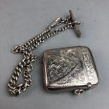 A SILVER VESTA CASE AND A SILVER ALBERT CHAIN