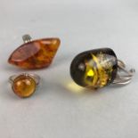 A LOT OF SILVER AND AMBER JEWELLERY