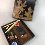 AN EARLY 20TH CENTURY JAPANESE LACQUERED WRITING BOX