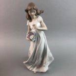 A LLADRO FIGURE OF A GIRL WITH FLOWERS