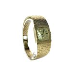 A LADY'S ACCURIST 1970s GOLD WRIST WATCH