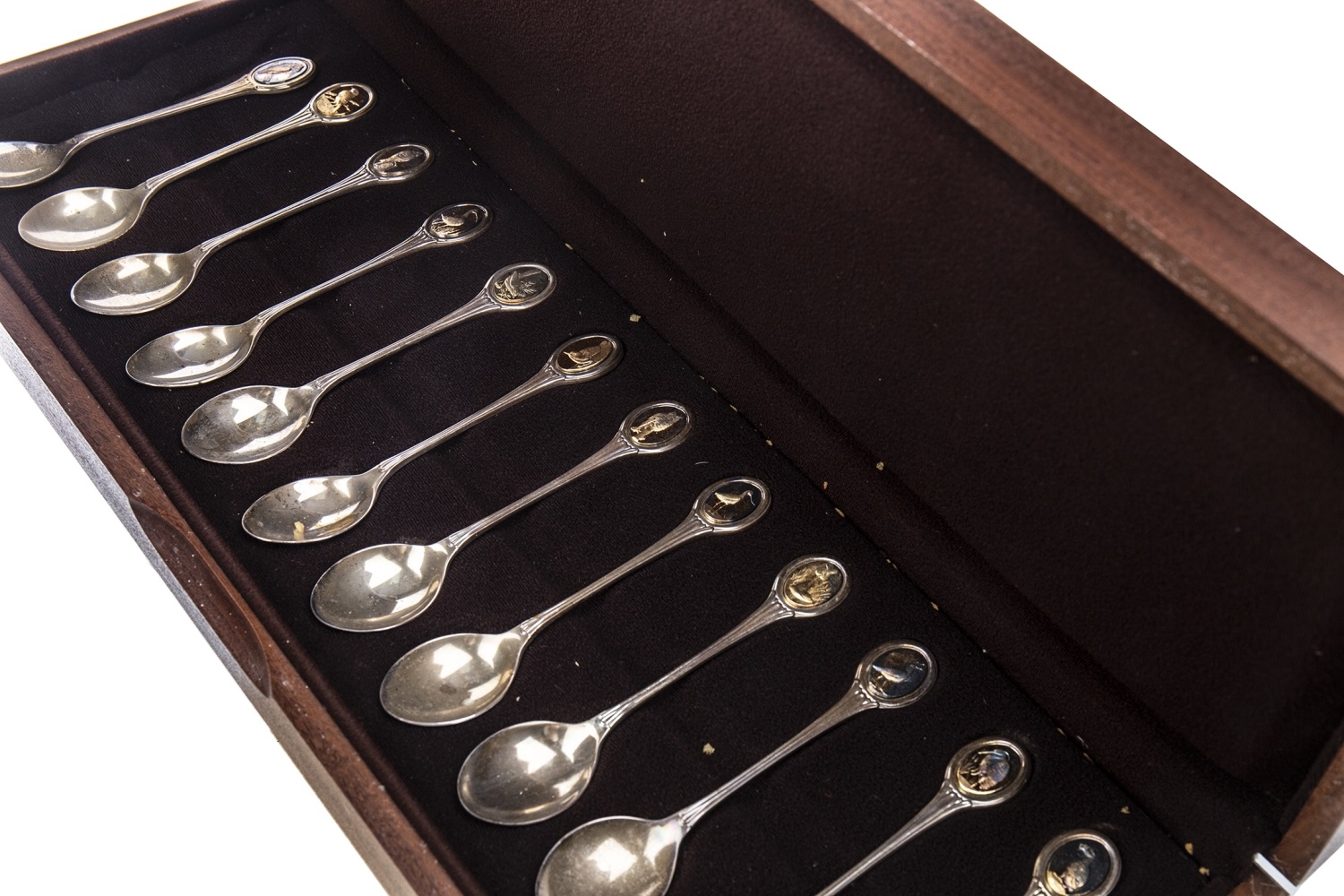 A SET OF TWELVE RSPB SILVER SPOONS