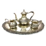 A SILVER TRAY AND A THREE PIECE TEA SERVICE