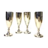 A SET OF FOUR ASPREY SILVER WINE FLUTES