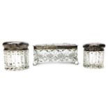 A LOT OF THREE SILVER TOPPED DRESSING TABLE JARS
